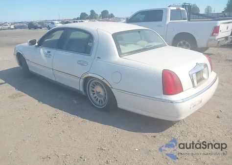 2001 Lincoln Town Car Cartier from USA, damaged, VIN 1LNHM83W51Y613140